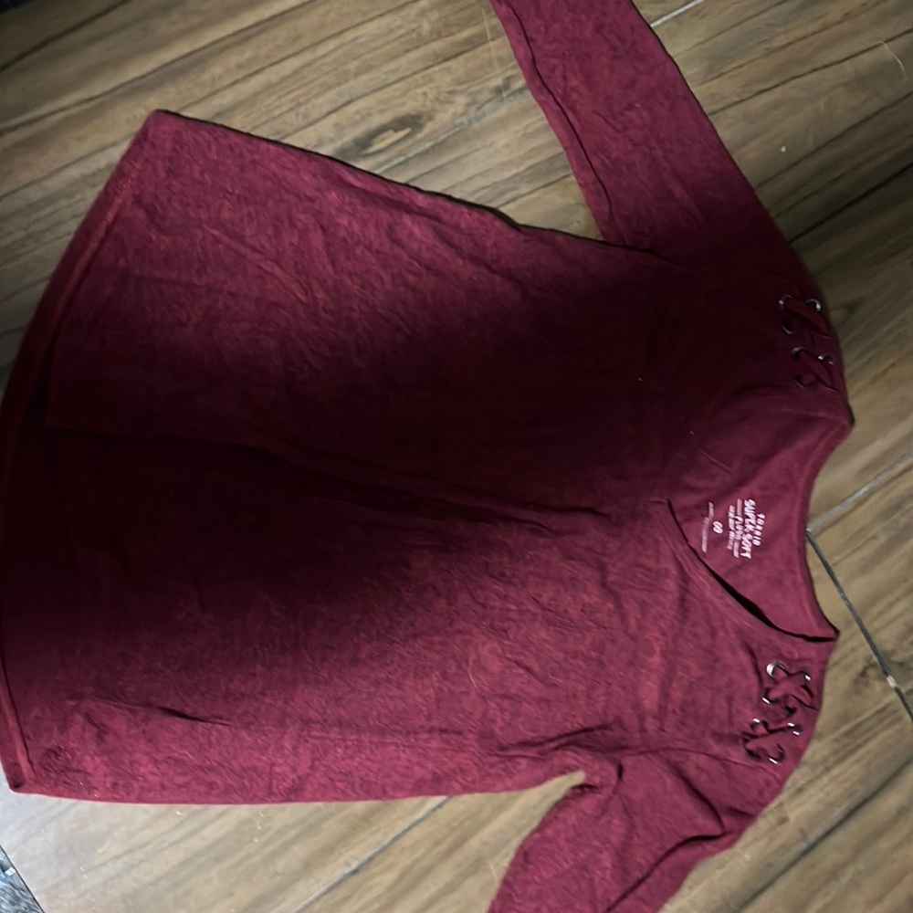 A cross nit shoulder v- neck sweatshirt